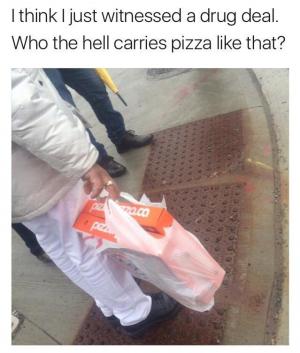 I think I just witnessed a drug deal. Who the hell carries pizza like that?